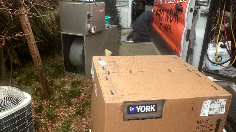 A new YORK unit being unloaded from the Comfort Pro truck at a job site