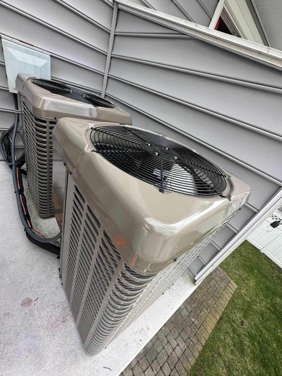 Air conditioning condensers on a rooftop deck at a Cape May County property